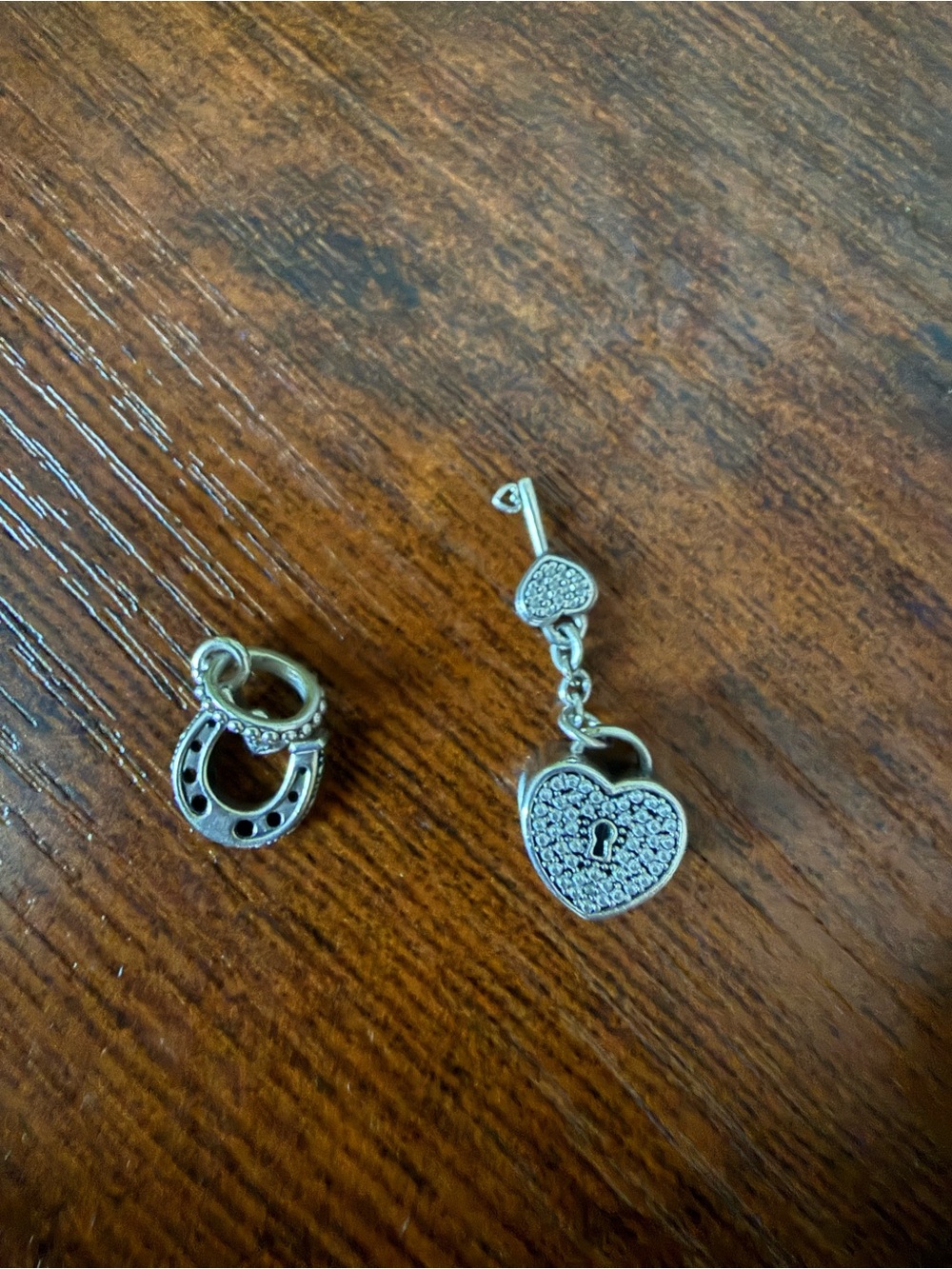 Pandora heart lock and horseshoe lucky charm